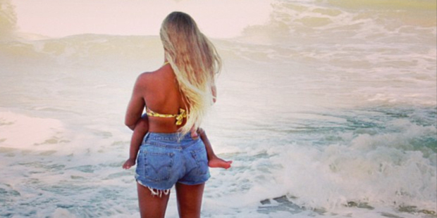 Beyonce and daughter Blue Ivy enjoying the Kiwi surf.
