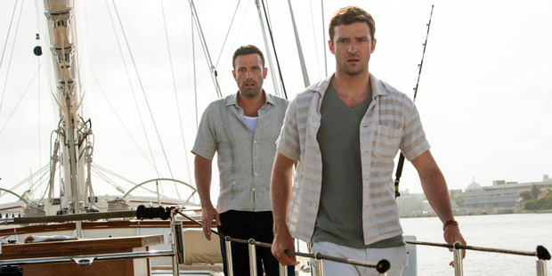 Ben Affleck and Justin Timberlake in 'Runner, Runner'. Photo / AP