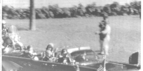 The motorcade through Dealey Plaza. Photo / AP