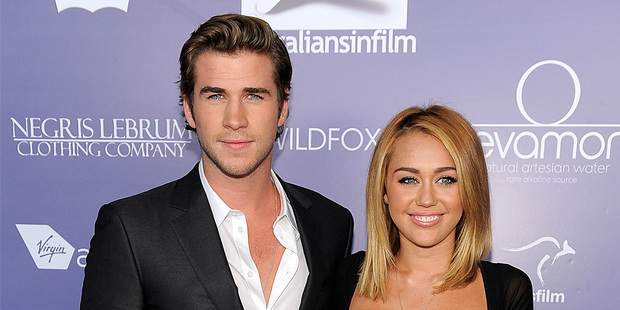 Liam Hemsworth and Miley Cyrus. Photo / AP