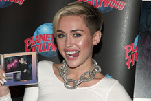 Miley Cyrus attends an album release signing event. Photo / AP