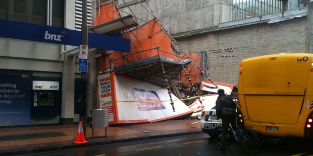 The high winds brought down this scaffolding on Willis Street in Wellington, although there were no injuries. Photo / Richard MacLean