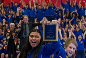 STUDENT SUCCESS: Kaitao Intermediate School head girl Tyla Leo (left) and head boy Stacee Jones with Rotorua Mayor Steve Chadwick (back left) and principal Rory O'Rourke celebrate their National School of Character award. PHOTO/STEPHEN PARKER 251013SP1