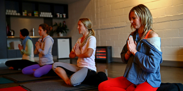 Yoga can stretch the mind as well as your muscles and is an excellent way to rid yourself of stress. Photo / Getty Images