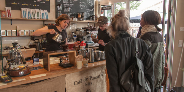 Roz Morris and Sadry Abidi at Mokxa, their cafe in Lyon, France.