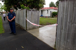 The Te Aroha Street property remains cordoned off while police investigate the teenager's death. Photo / Christine Cornege