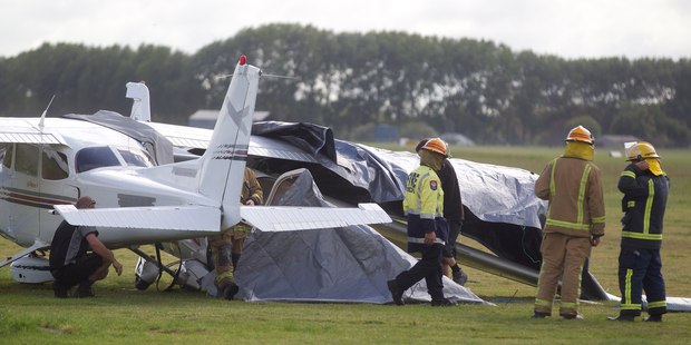 A light aircraft has crashed into a parked plane after an emergency landing this morning at the Waikato Aero Club. Photo / Christine Cornege