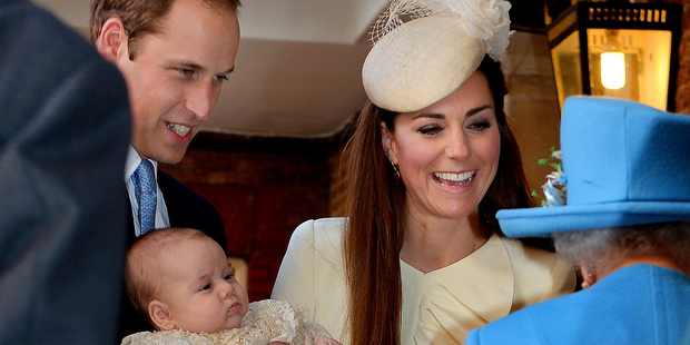 Britain's Queen Elizabeth II, right, speaks with Prince William and Kate Duchess of Cambridge as they arrive with their son Prince George. Photo / AP