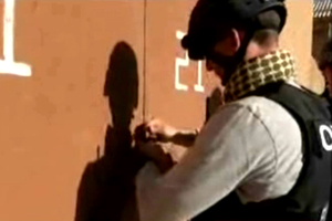 A chemical weapons expert works at a chemical weapons plant at an unknown location in Syria. Photo / AP