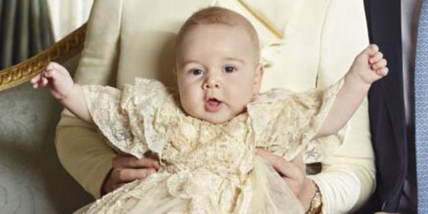 Prince George seems pretty happy at his christening.Photo / Jason Bell