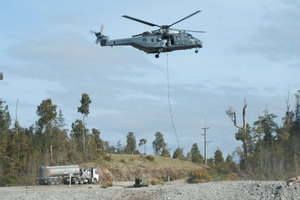 A RNZAF NH90 helicopter operating at Pike River Mine, under-slinging heaving loads from the mine ventilation shaft. Photo / NZ Defence Force