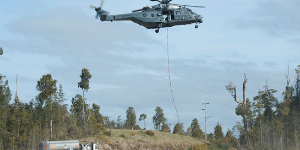 A RNZAF NH90 helicopter operating at Pike River Mine, under-slinging heaving loads from the mine ventilation shaft. Photo / NZ Defence Force