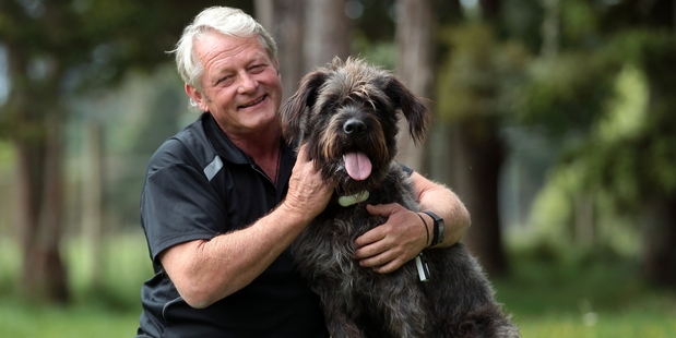 Animal trainer Mark Vette with his star dog Monty at his property in Waimauku, Auckland. Photo / Doug Sherring