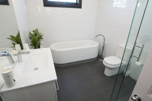The bathroom in Alice and Caleb's home from The Block. Photo / supplied