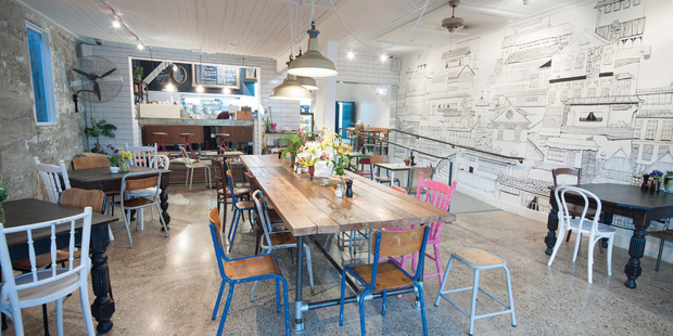Little King Cafe has an impressive array of tables and chairs, mixing an industrial look with vintage timber.