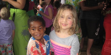 Orisi and Mia Kara dancing at the Fijian village Vunaqow on the Sigatoka River.