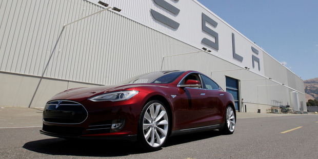 A Tesla Model S driving outside the Tesla factory in Fremont. Photo / AP