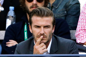 David Beckham watches play between Rafael Nadal, of Spain, and Novak Djokovic, of Serbia, during the men's singles final of the 2013 U.S. Open tennis tournament, Monday, Sept. 9, 2013, in New York. (A