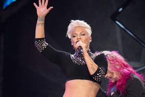 Pink has hit back at those who think she shouldn't let her daughter ride on a motorcycle. Photo / AP