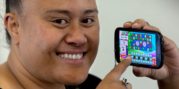 Fuarosa Taito-Alo says she uses her phone for games rather than talking or texting. Photo / Brett Phibbs