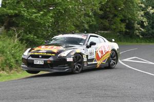Five-time Targa winner Tony Quinn and co-driver Naomi Tillett in action. Picture / Groundsky Photography