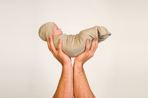 Baby swaddles have become popular, but there are dangers - expert.Photo / AP