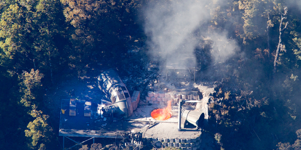 Flames leap from the ventilation shaft at the Pike River Mine after the November 2010 explosion. Photo / Mark Mitchell