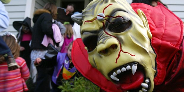 Children traditionally get dressed in scary get-ups and head out to disturb their suburb and score a few special treats in the process. Photo / Dean Purcell