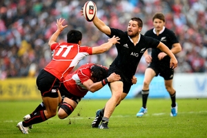 Most of the Japan team were giving away height and weight to Dane Coles and the rest of their All Black opposites in last night's test in Tokyo. Photo / Getty Images