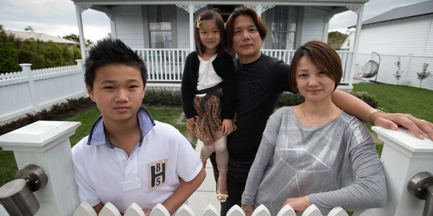 Stella Shen - above with husband Alex Shi and children Aaron and Katie - chose the house for her sister and brother-in-law. Photo / Richard Robinson