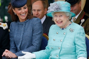 The Queen (pictured with the Duchess of Cambridge) remains popular in NZ, but former ambassador Peter Hamilton says her role doesn't help us.