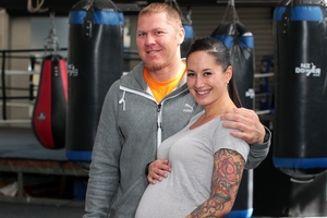 Shane Cameron with his wife Tara Puke are expecting a child at the same time Cameron fights in January. Photo / Doug Sherring