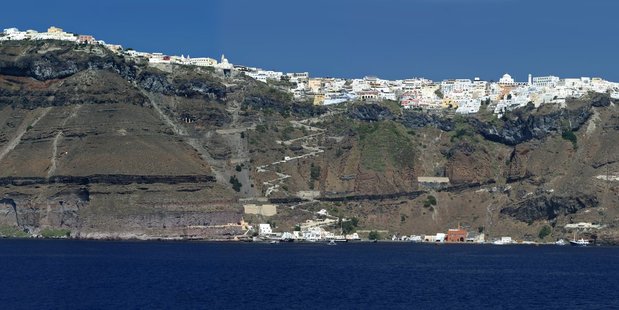From a distance, the cluster of pure white buildings on the rim of Santorini's volcanic caldera looks like a coating of fresh snow. Photo / Justine Tyerman