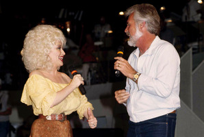 Dolly Parton with Kenny Rogers, with whom she had a hit record in 1983, 'Islands in the Stream'. Photo / AP