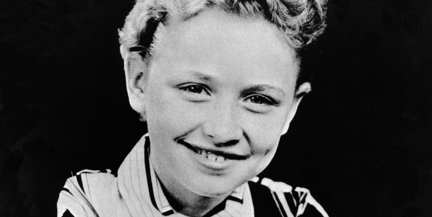 Dolly as a schoolgirl in the 50s. Photo / Michael Ochs