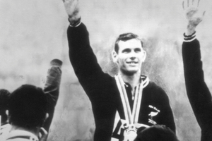 Peter Snell celebrates his 1500m gold at the Tokyo Olympics in 1964. (NZ Herald Archive)