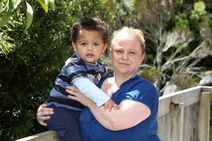 Julie Finemore, with Liam Jansen, 3, the youngest of four, is glad the Salvation Army can help. Picture / Chris Gorman