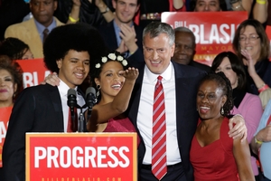 Bill de Blasio poses with son Dante, daughter Chiara and wife Chirlane after he was elected the first Democratic Mayor of New York City in 20 years. Photo / AP