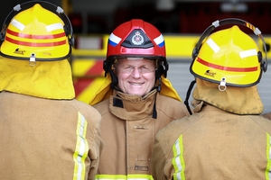 BOLD: Mount Maunganui fire service station officer Terry Mills stands out with his new red helmet.PHOTO/JOHN BORREN 081113JB09BOP