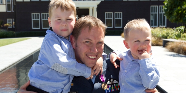 Ben Pryor, with sons Hamish, 4, (left) and Craig, 2, flew amid a hail of bullets. Photo / Mark Mitchell