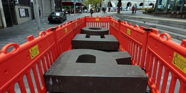 The shared-space concept in Lorne St hasn't been kind to the letter-seat outside the library. Photo / Doug Sherring