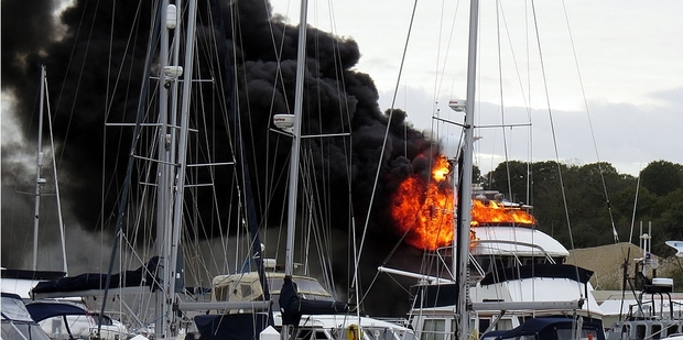 Paul Rudling's 23m vessel ablaze in Cowes marina on the Isle of Wight. Photo / Anthony Joyce
