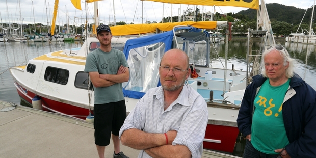 EAST COAST PROTEST: Oil Free Seas Whangarei representative James Bellamy, Putangitangi skipper Pete Shierny, and Mine Watch Northland spokesman Tim Howard were displaying the anti-deep sea drilling message at Whangarei Town Basin. PHOTO/JOHN STONE