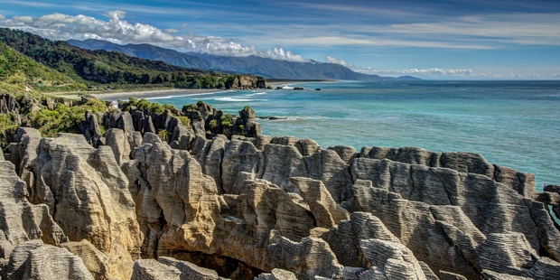 Visitors can take the famous Coast Road to the Punakaiki Rocks, north of Greymouth. Photo / Getty Images