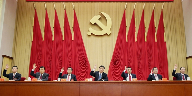 Chinese President Xi Jinping (centre) and other Communist Party leaders are promising a bigger role for market forces.Picture / AP