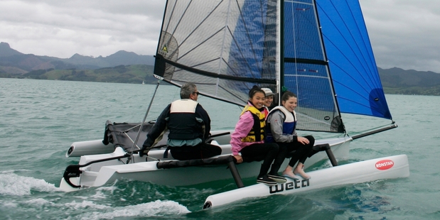 The user friendly 4.4 trimaran sailing dingy.