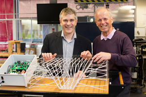 Professor Grant Covic, left, and Professor John Boys of Auckland University have won this year's prize for engineering wireless charging technology for electric cars and other devices.