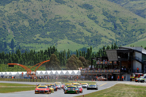 The start of the opening GT race (top) at Highland Park, near Cromwell. Highland Park owner Tony Quinn (below) on the track. Pictures/John Morris