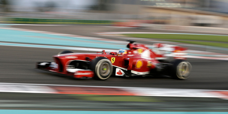 Ferrari driver Fernando Alonso steers his car during the Emirates Formula One Grand Prix at the Yas Marina racetrack in Abu Dhabi, United Arab Emirates. Photo / AP