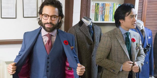 Michael Lavigne, left, wears a bulletproof vest made by made by Garrison Bespoke tailors, beside co-owner Michael Nguyen.
Photo / AP